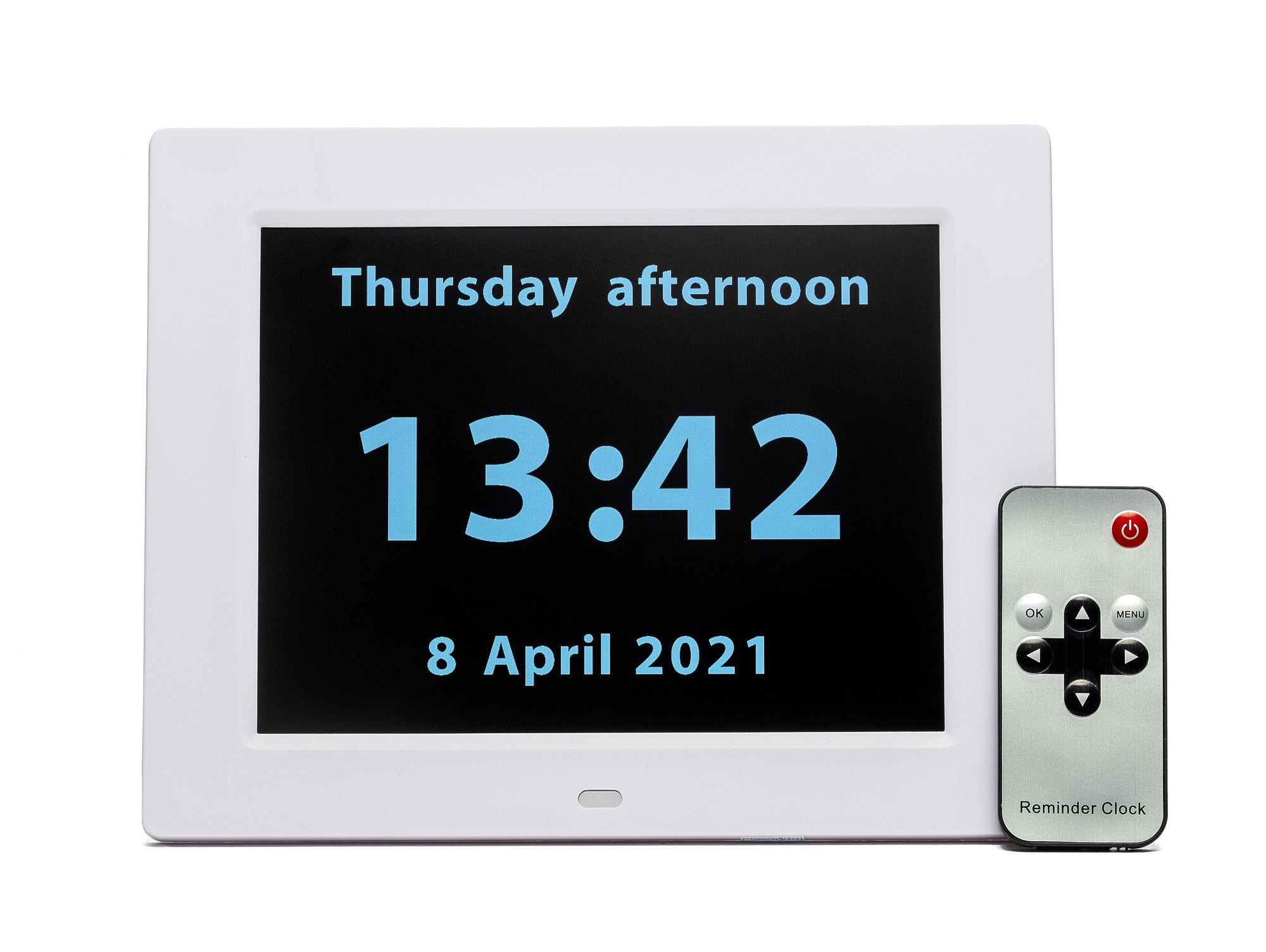 The clock has a thick white border and black screen which displays the day, time, date and year in clear pale blue alphanumeric digital display.  Across the top of the screen the text reads'Thursday afternoon'. Across the bottom of the screen, in the same font, the text reads '8 April 2021'.  In the middle of the screen the time is given in large 24-hour clock numbers. 