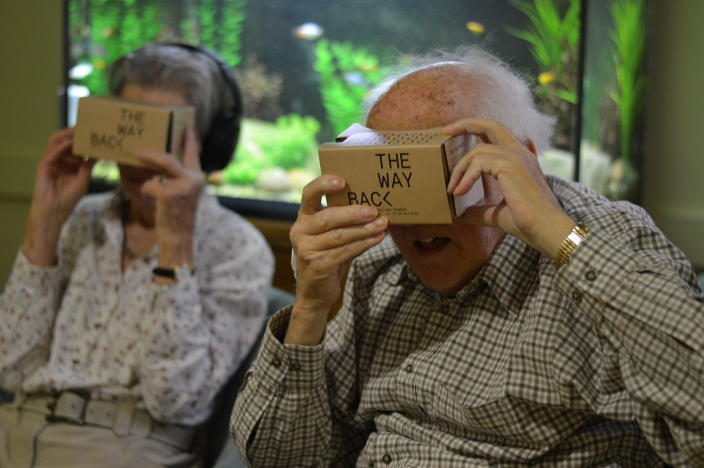 Two older people looking into The Way Back VR product