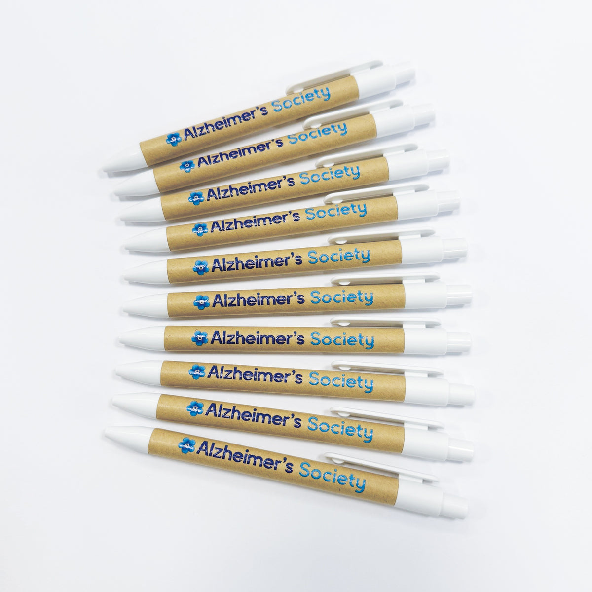 Ten white Alzheimer's Society ballpoint pens with recycled cardboard barrel and blue flower logo and name