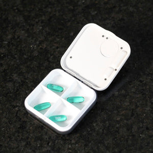 Pill box with vibrating alarm