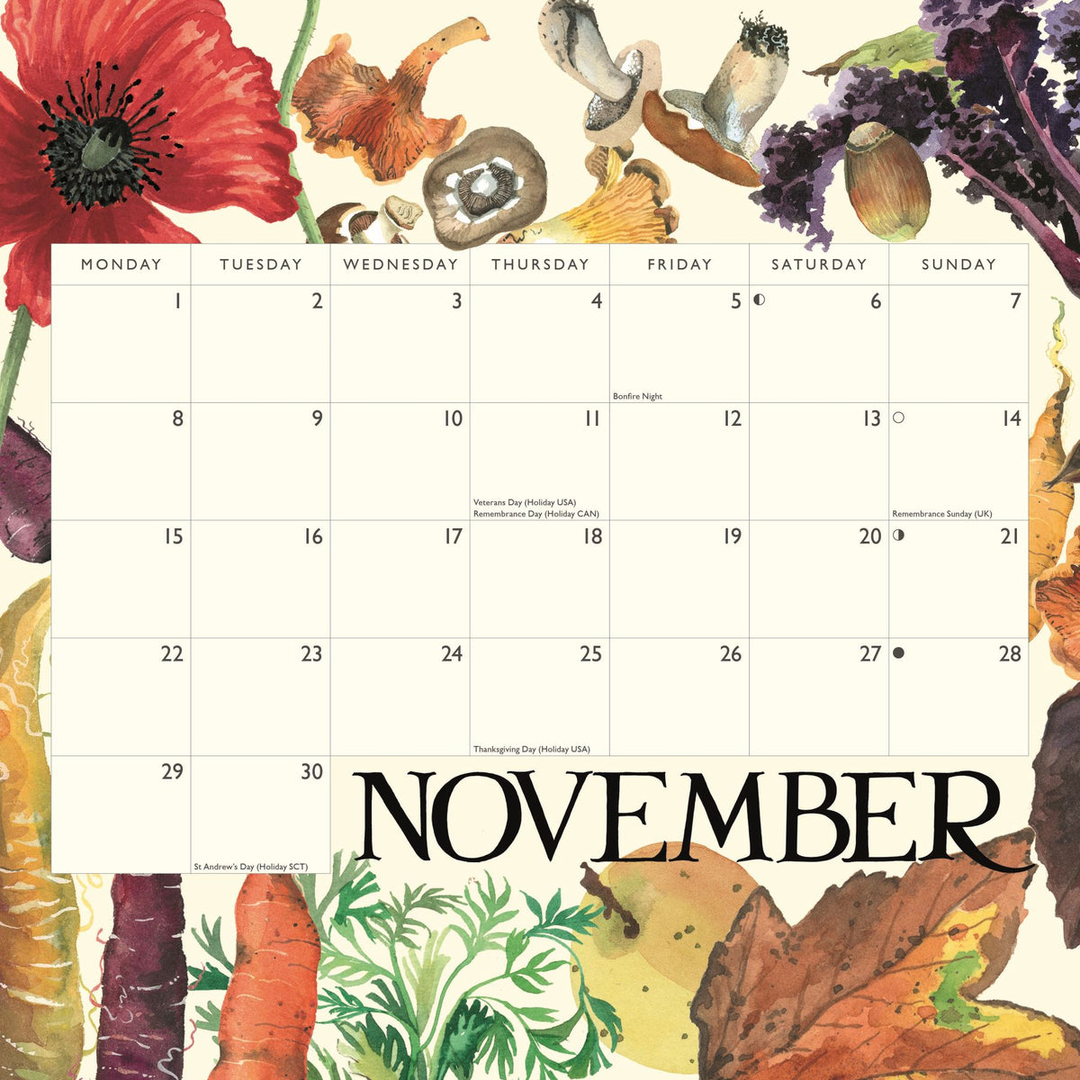 A November planner calendar page with a watercolor autumn botanical border featuring red poppies, mushrooms, grapes, carrots, and leaves. The center shows a blank Monday-through-Sunday grid with the word NOVEMBER in large black letters at the bottom.
