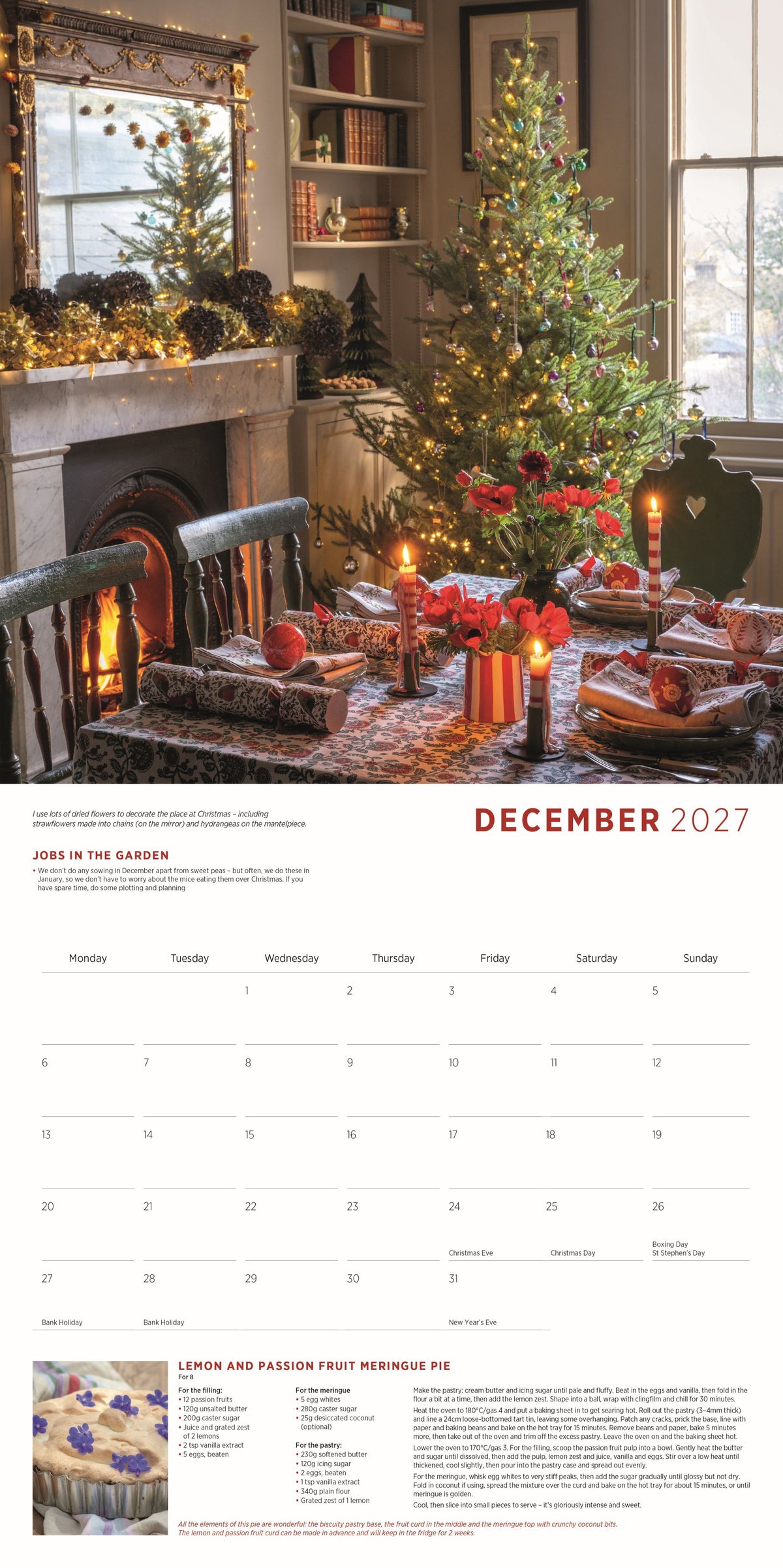 December 2027 calendar featuring a festive dining room with a decorated Christmas tree, candlelit table, and lit fireplace.