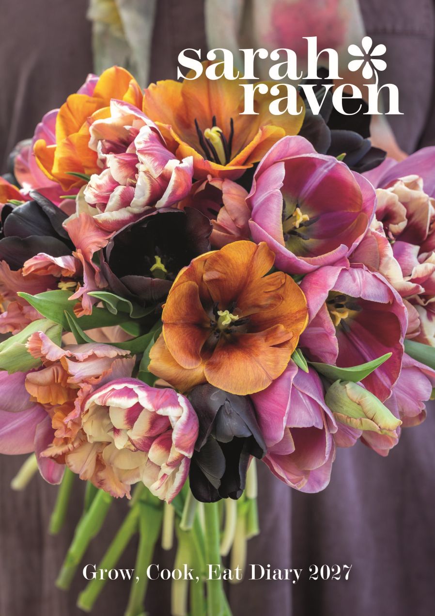 Front cover of the Sarah Raven Grow, Cook, Eat Diary 2027, featuring a close-up photograph of a colorful flower bouquet with tulips in shades of orange, pink, purple, and black against a soft purple background.