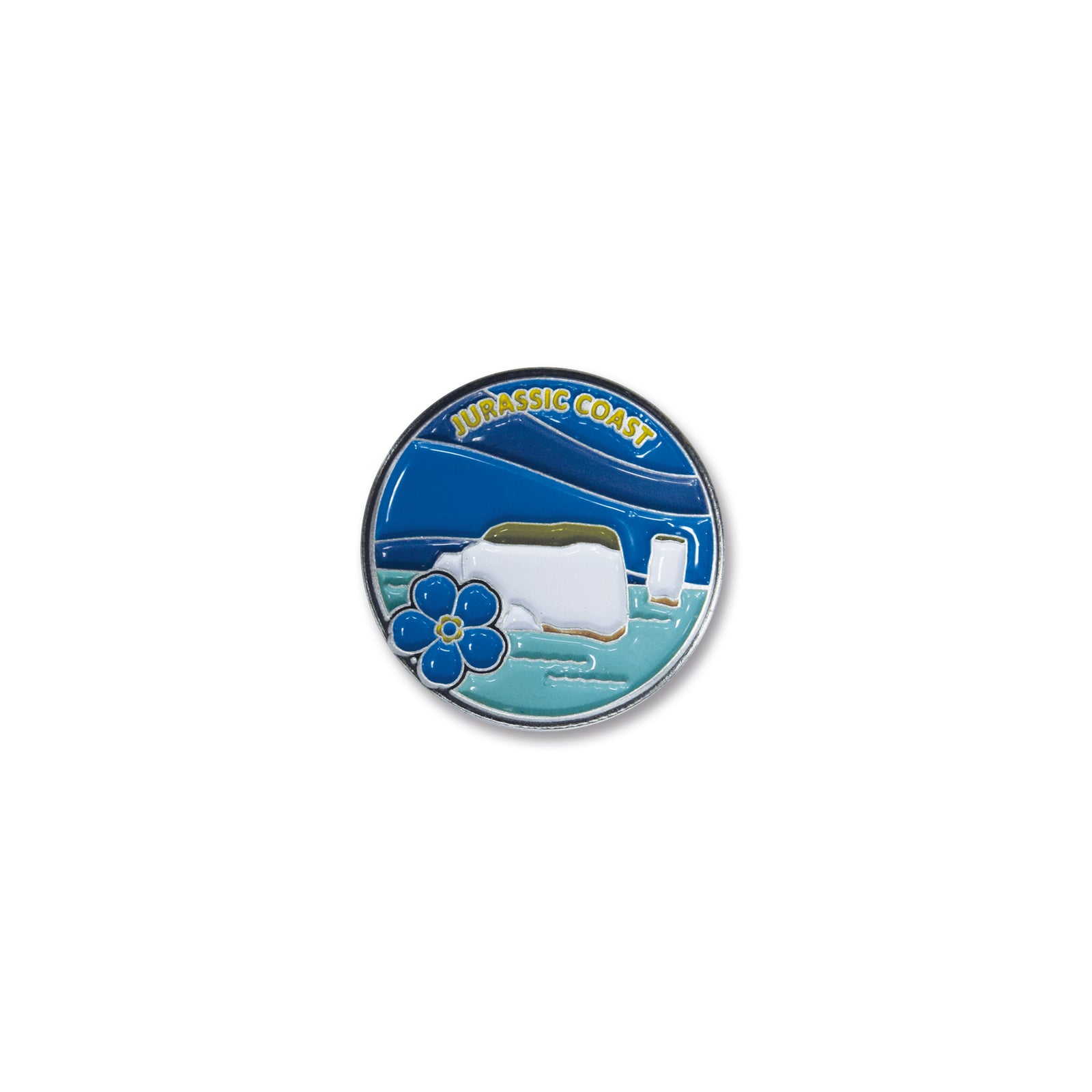 Round enamel pin with 'Jurassic Coast' design on a white background