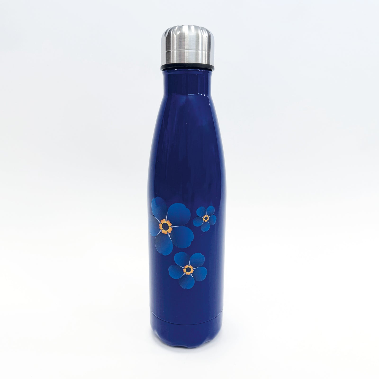Blue insulated metal bottle featuring 3 blue forget-me-not flower logos on  a navy background and a silver bottle top.
