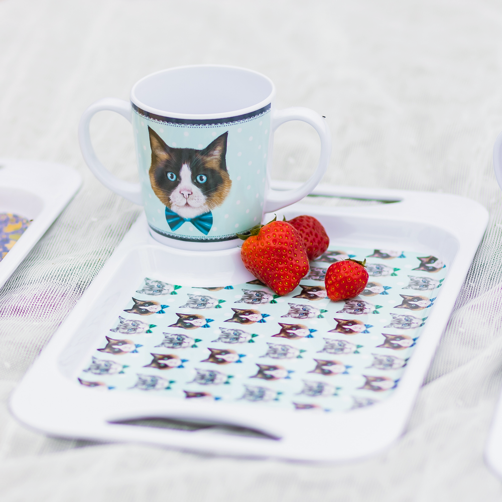 Two handled mug and tray with cat print with room for a snack such as the featured strawberries 