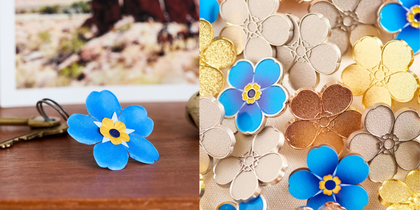 Blue flower-shaped pin badge on a wooden surface with a blurred background and a collection of gold, silver, rose-gold and blue metal and wooden flower pin badges.