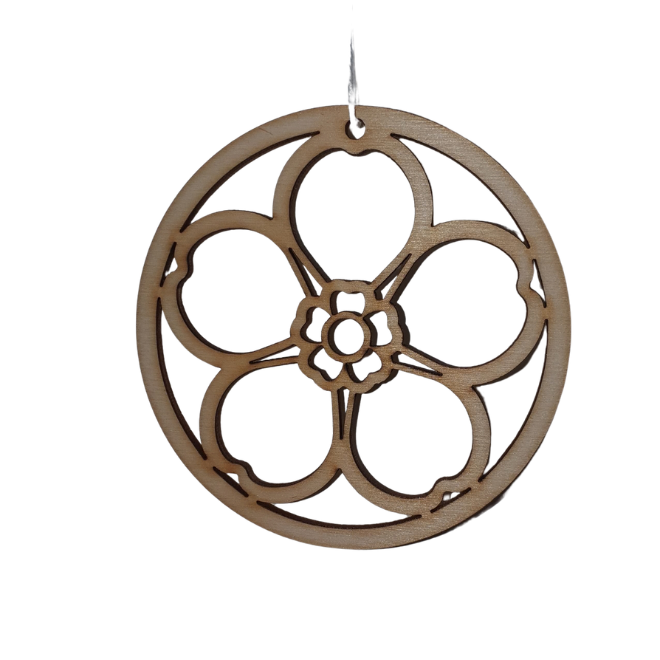 A circular wooden hanging ornament with a five-petal forget-me-not flower design, shown against a plain white background.