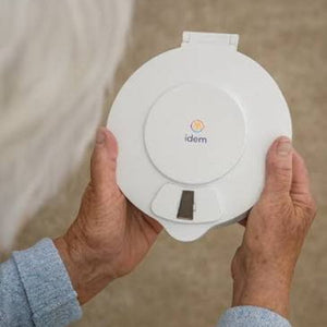 Idem pill dispenser with white lid