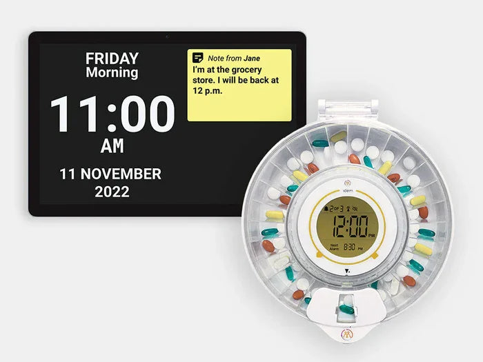 Idem smart reminder clock and pill dispenser with clear lid on a white background.