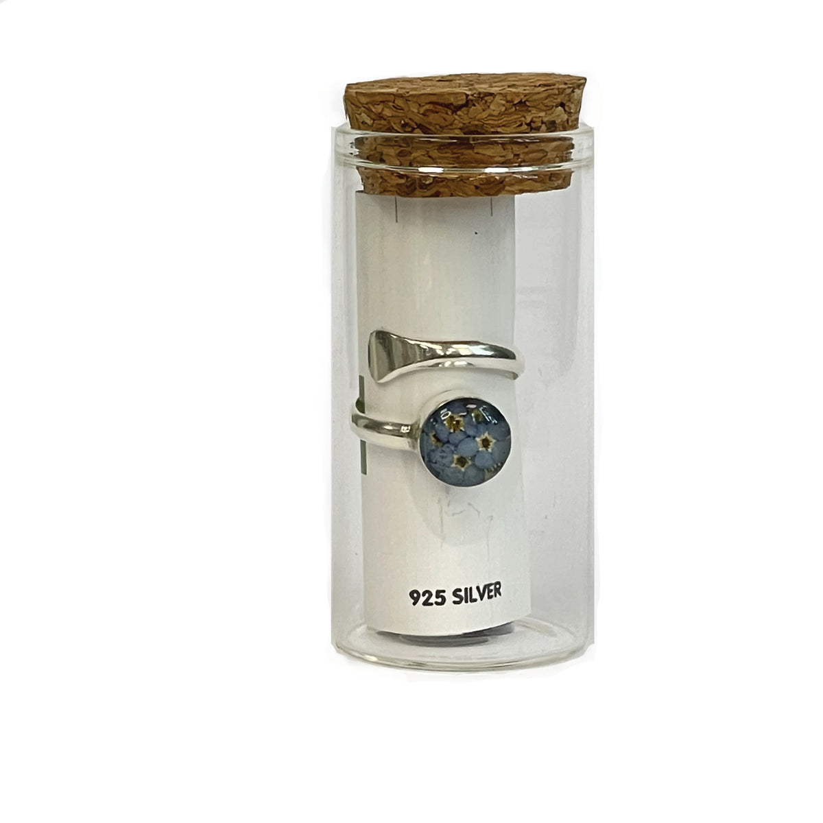 Silver twist ring with forget-me-not circle wrapped around card inside the keepsake glass bottle with cork lid.