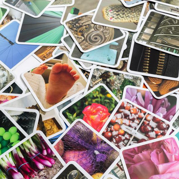 Scattered cards with photographic close-up images.