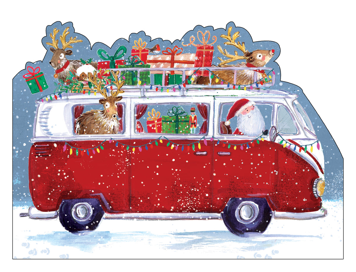 Shaped Christmas camper van card with reindeers and presents on the roof rack on a white background.
