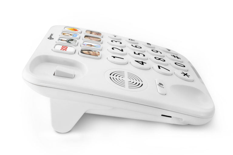 A white cordless telephone base with a numeric keypad, touch-style call buttons, and a speaker grille, photographed on a clean white background.