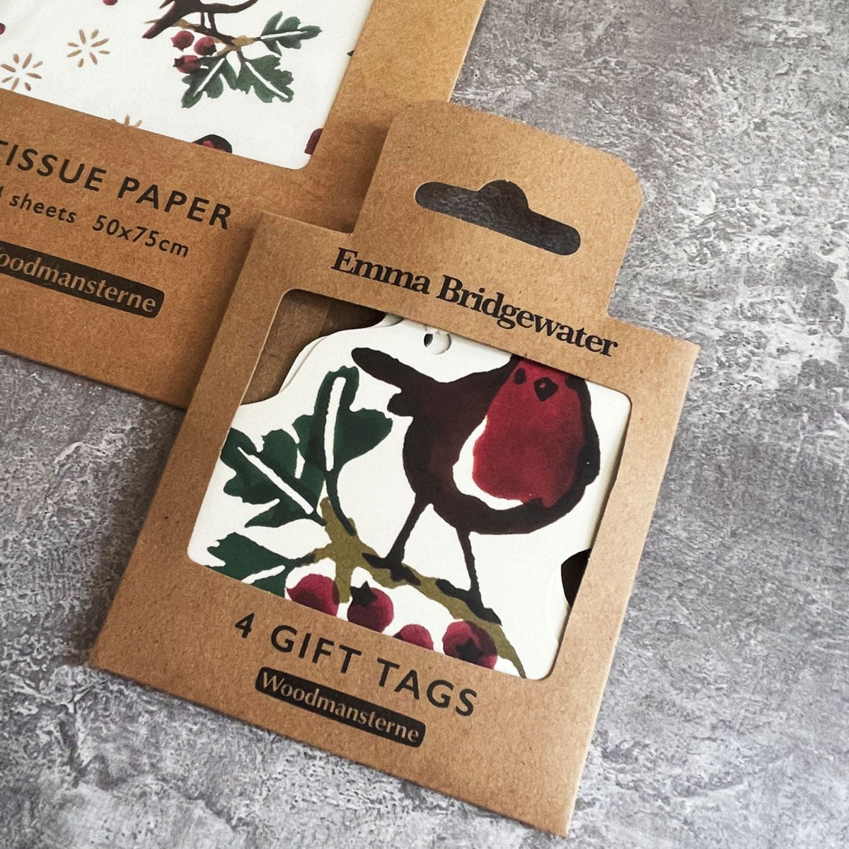Packaging of Emma Bridgewater gift tags with a robin design on a textured surface