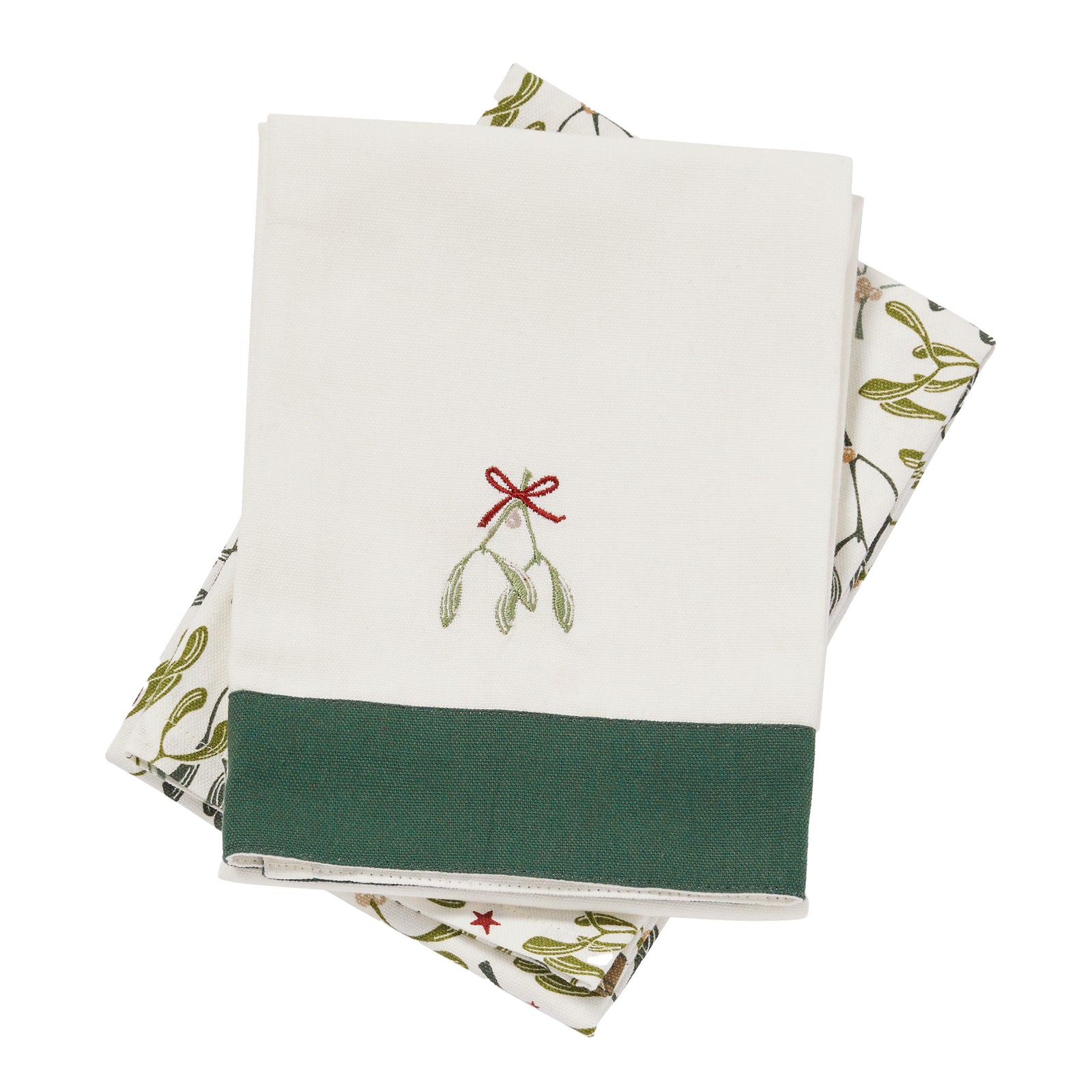 Folded fabric with mistletoe design on a white background