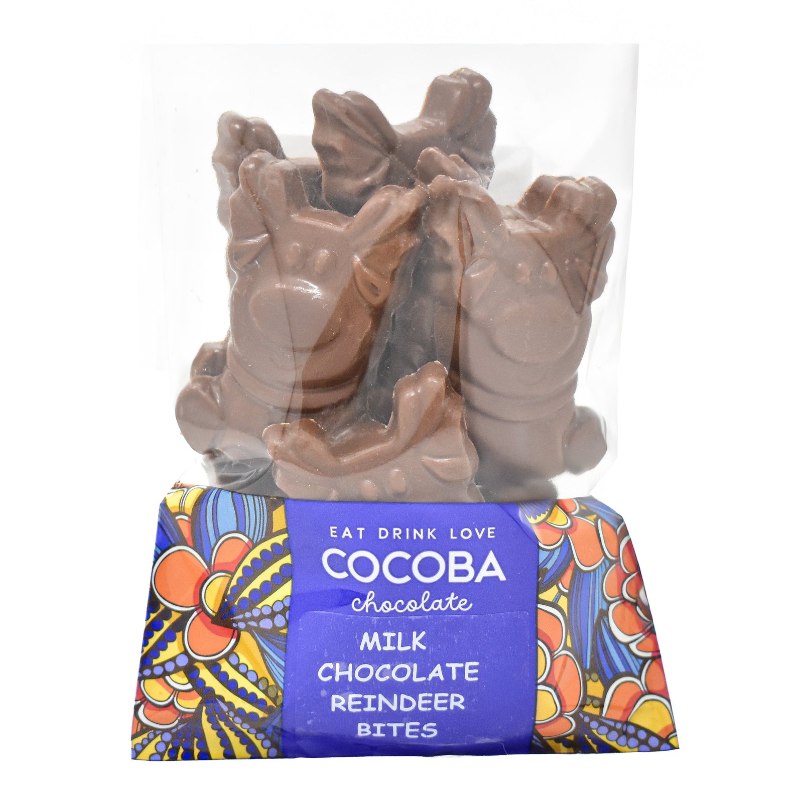 A package of Cocoba milk chocolate reindeer bites, featuring milk chocolate reindeer figures inside a clear plastic bag with a colorful patterned paper band at the bottom.