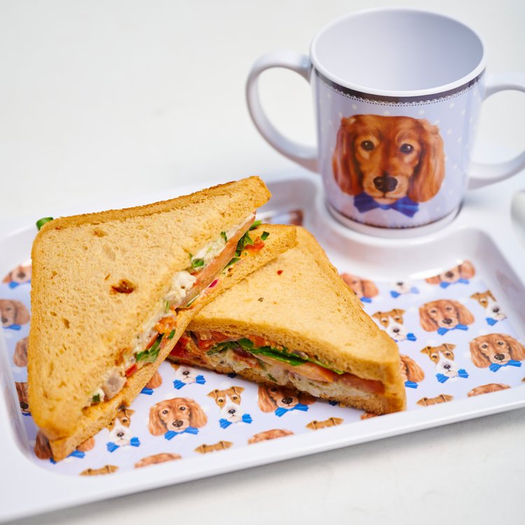 Two handled mug and tray with dog print with room for a real sandwich