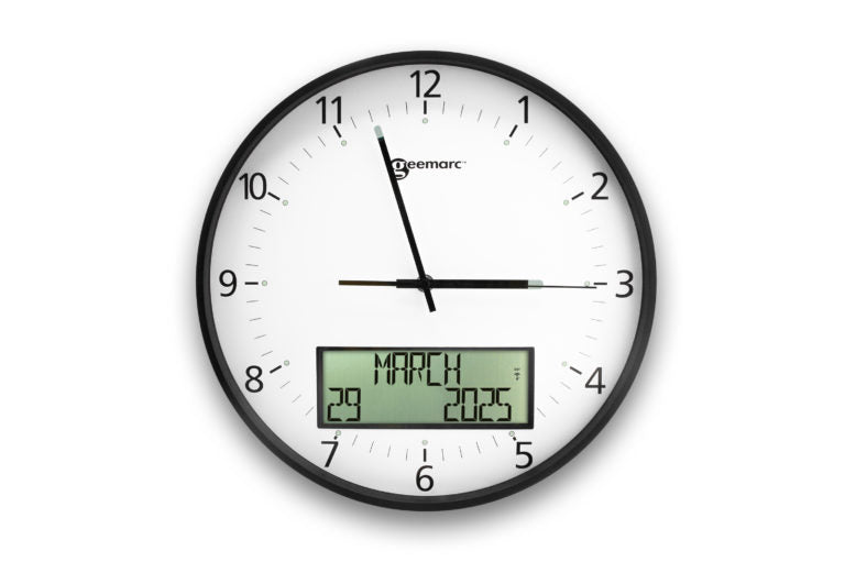 Large white analogue clock with digital display.