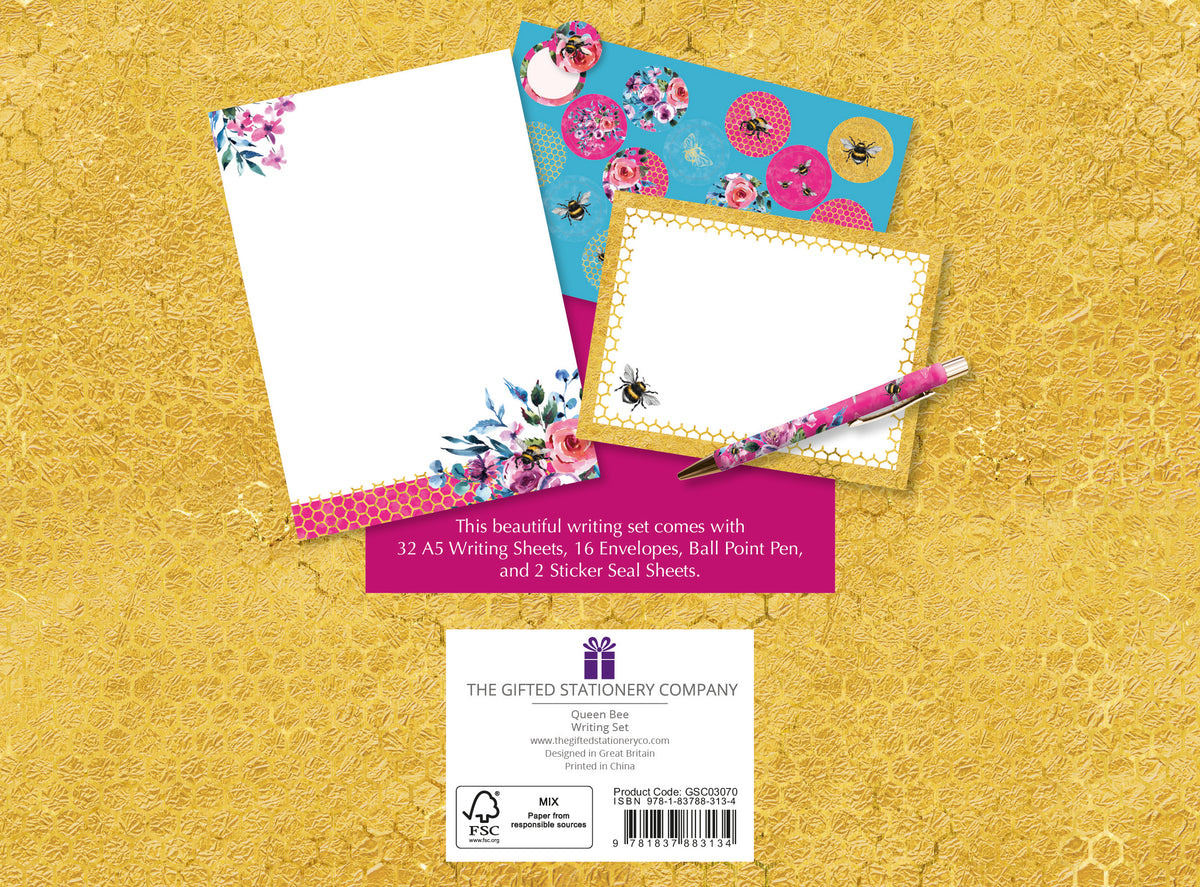Stationery set with writing sheets, envelopes, a pen, and seal sheets on a gold background.