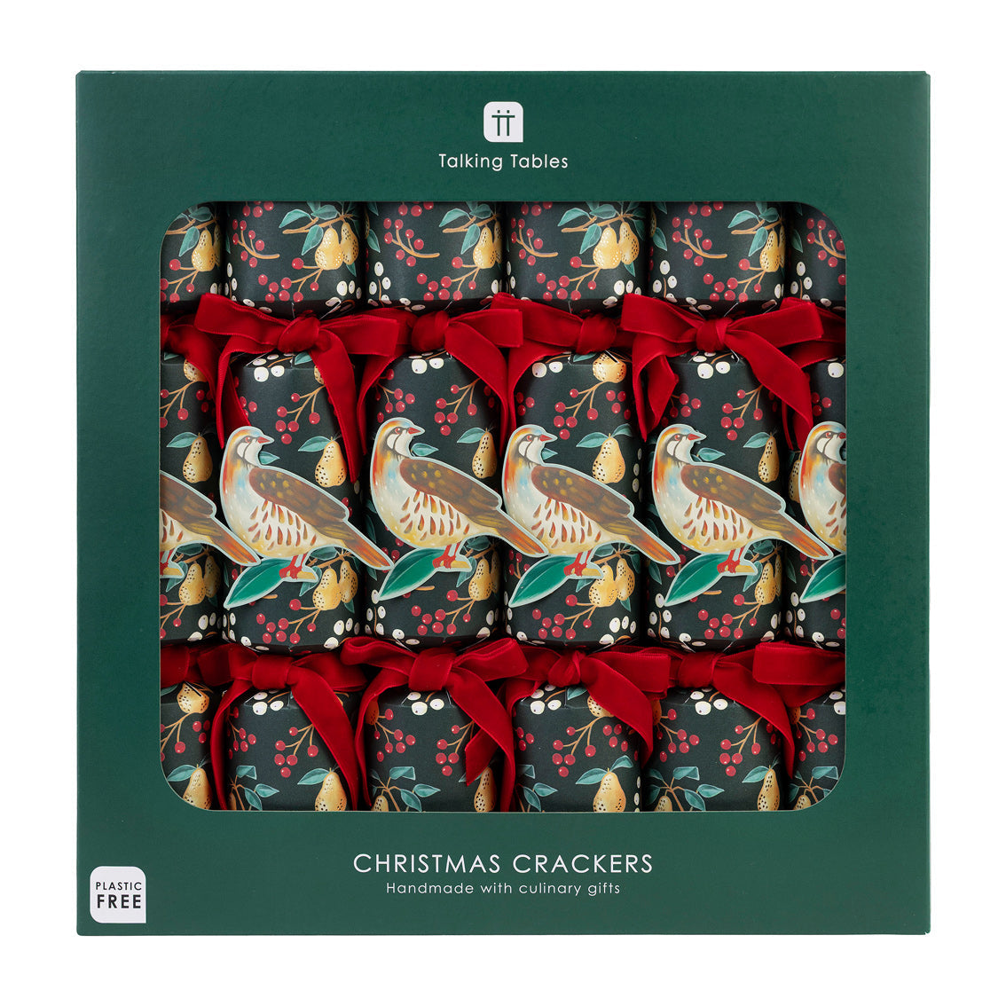 Box of Christmas crackers with bird and berry design, featuring red ribbons, in a green box.
