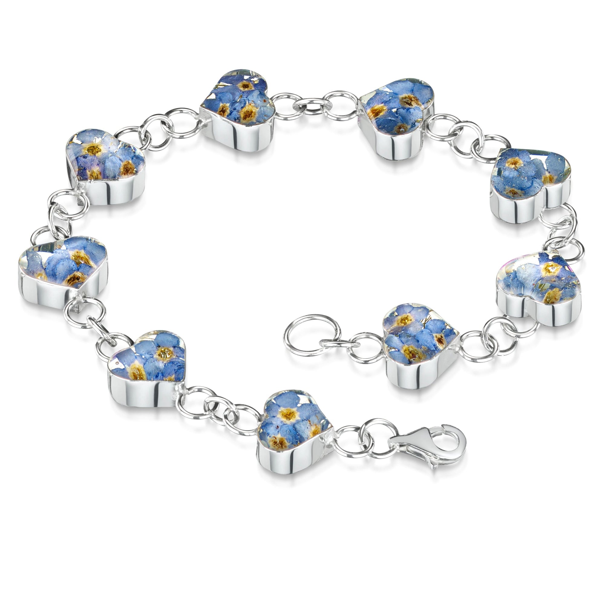 Sterling silver nine-heart bracelet with lobster clasp. Each heart charm has real forget-me-not flowers set in resin.
