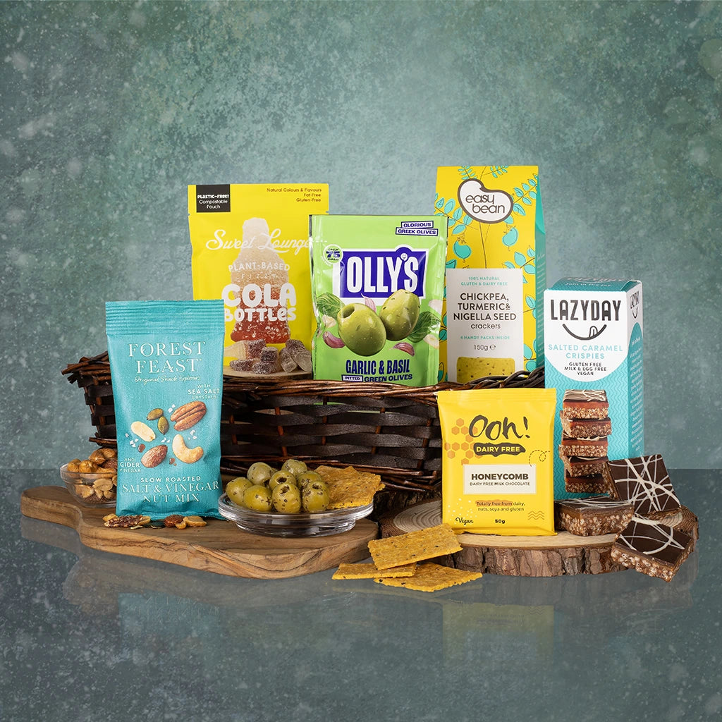 Vegan themed gift set with basket and a variety of food products.