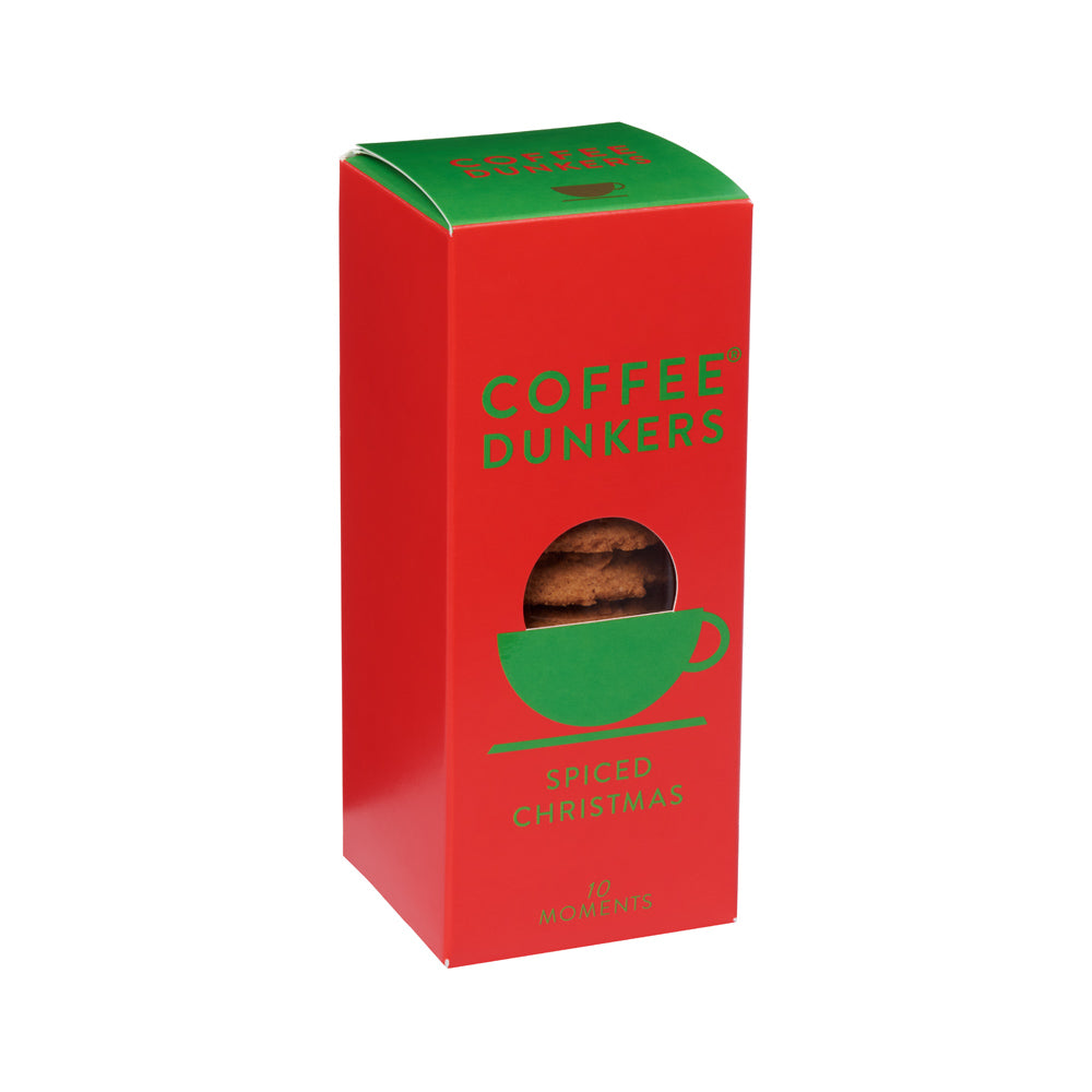 Red box of Coffee Dunkers Spiced Christmas cookies with green accents on a white background