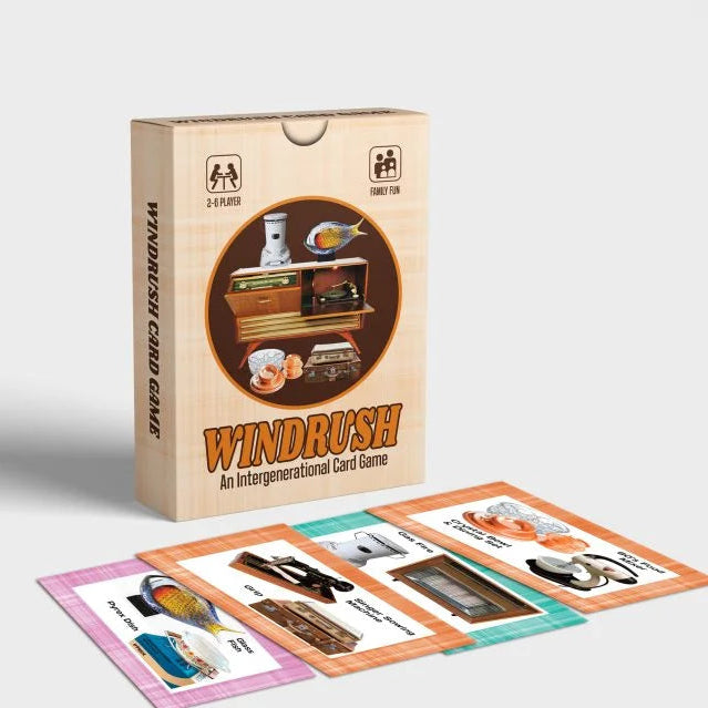 Windrush card game in a box with 4 playing cards laid flat on a white background.