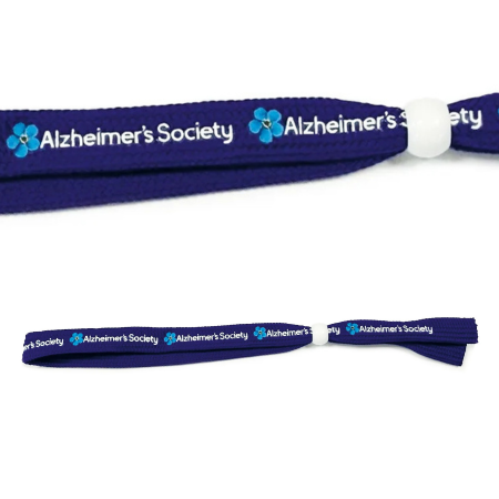 Navy blue wristband with Alzheimer's Society logo on a white background