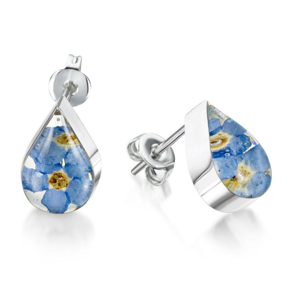 Sterling silver teardrop stud earrings with real forget-me-not flowers set in resin.  The earrings fasten with sterling silver butterfly backs.